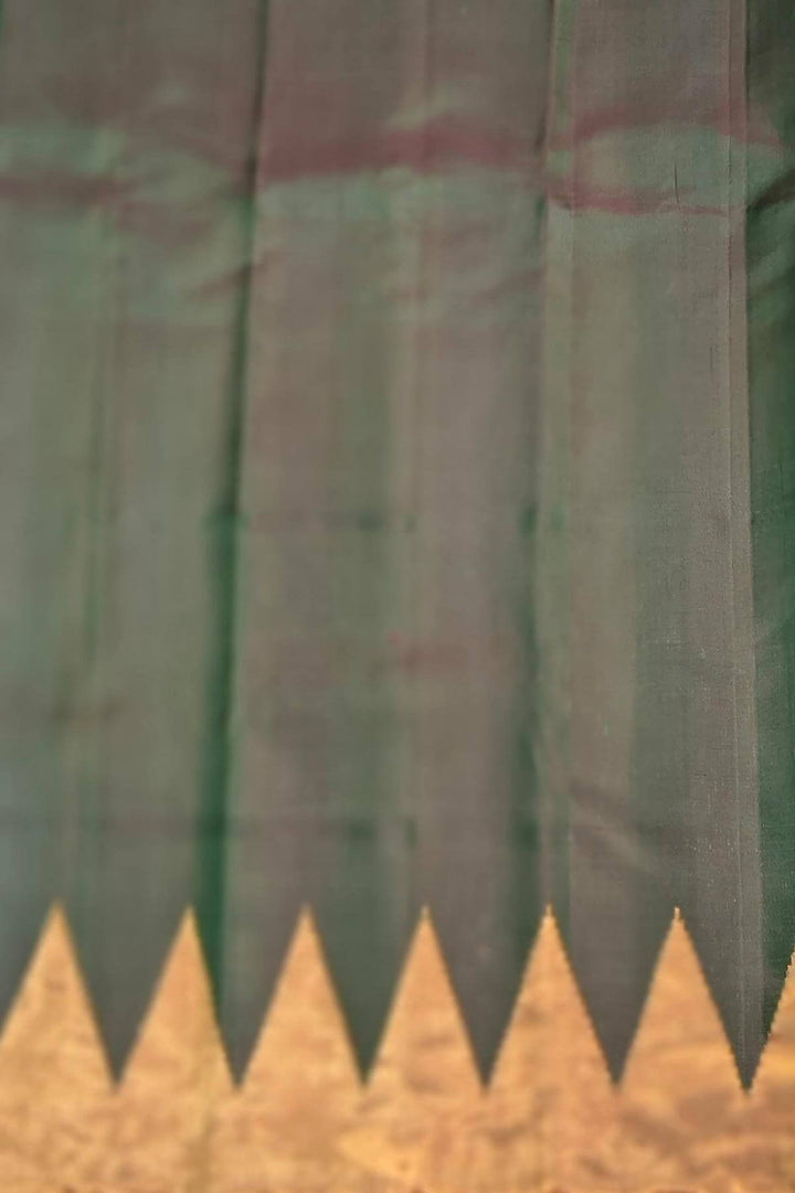 Gadwal pure silk saree in zari stripes in dark green