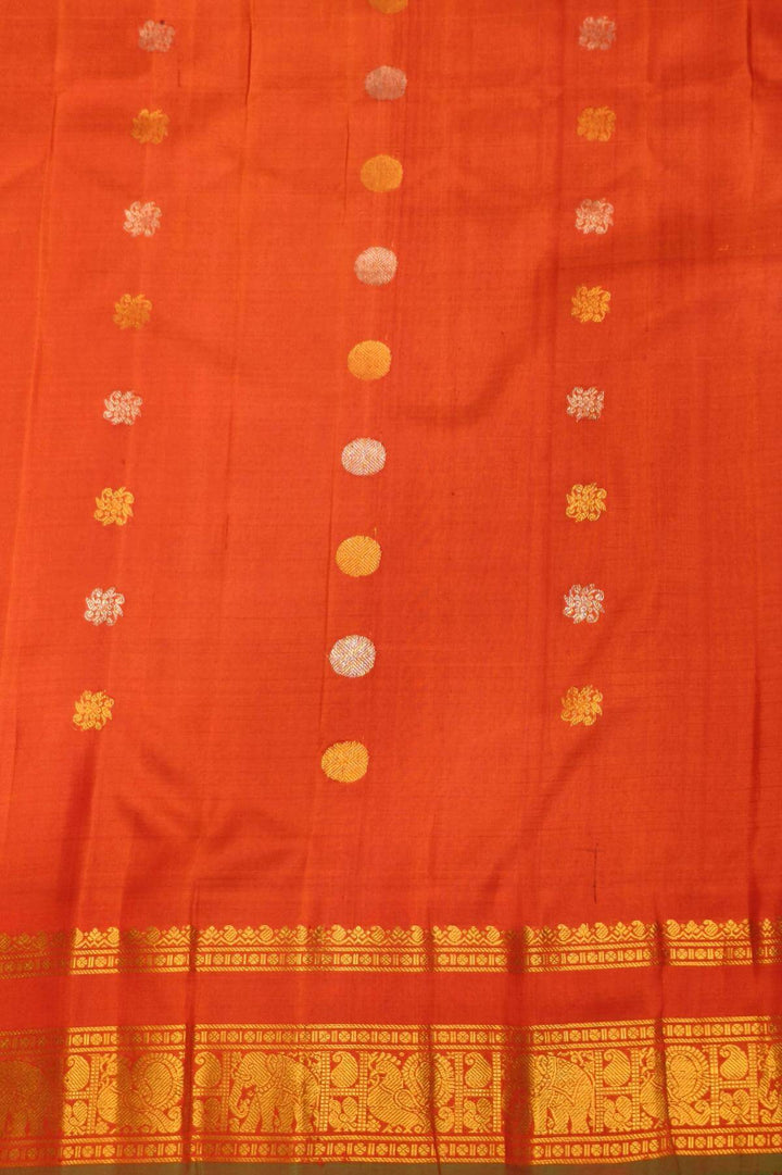 Gadwal pure silk saree in brown in fine checks  with  gold & silver buttis