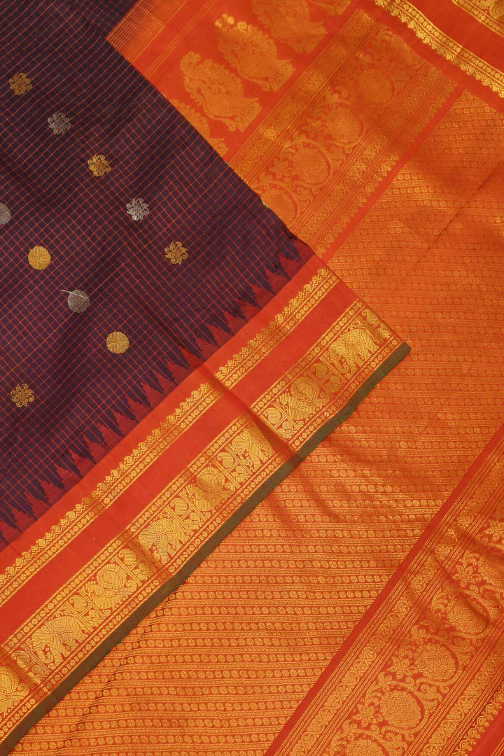 Gadwal pure silk saree in brown in fine checks  with  gold & silver buttis
