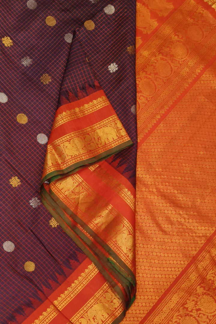 Gadwal pure silk saree in brown in fine checks  with  gold & silver buttis