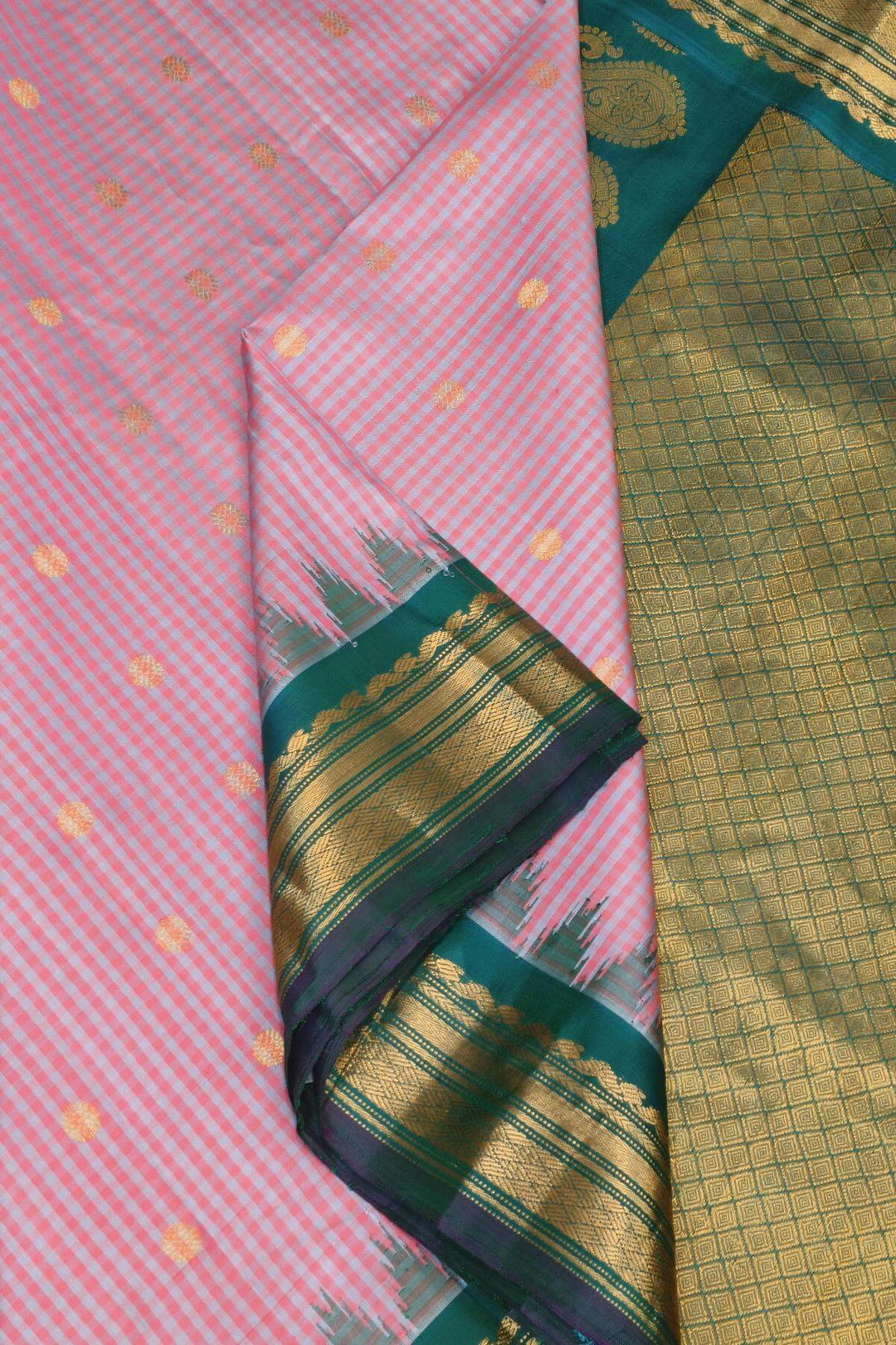 Gadwal pure silk saree in pink in fine checks  with  gold  buttis