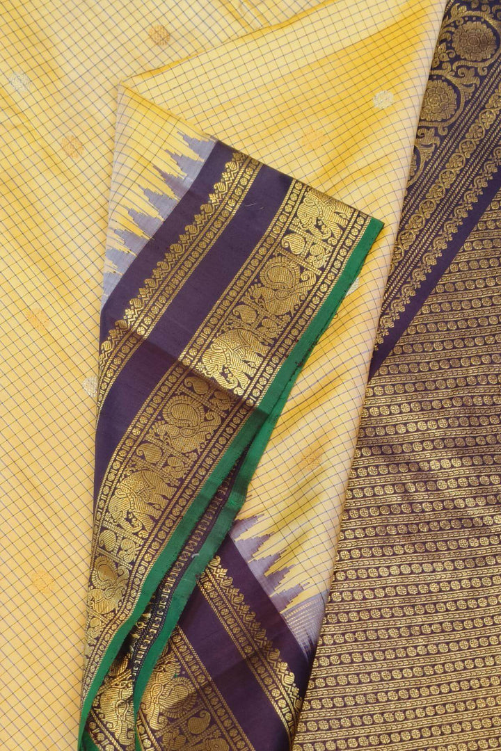 Gadwal pure silk saree in butterscotch in fine checks  with  gold & silver  buttis