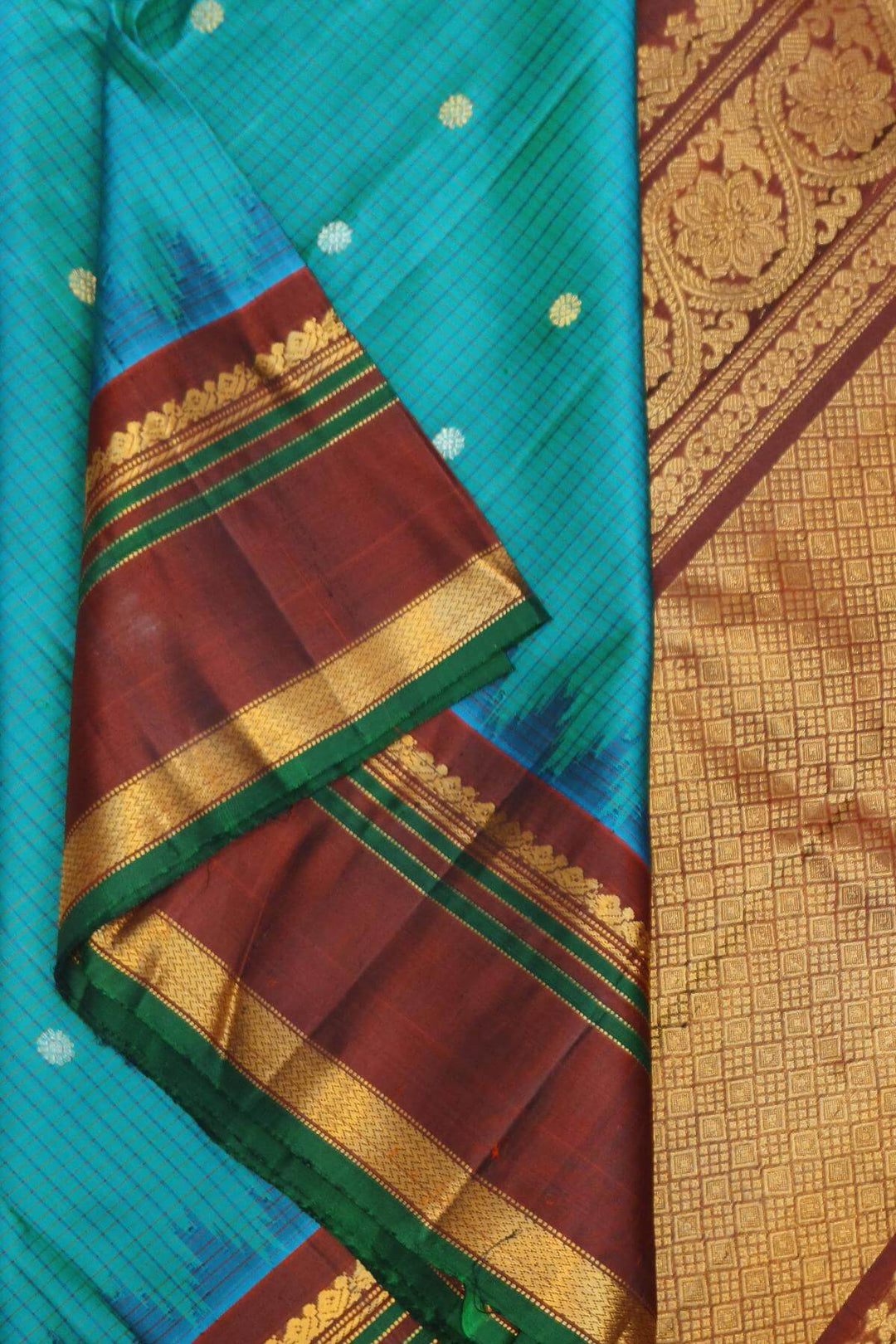 Gadwal pure silk saree in ananda blue in fine checks  with  gold & silver  buttis