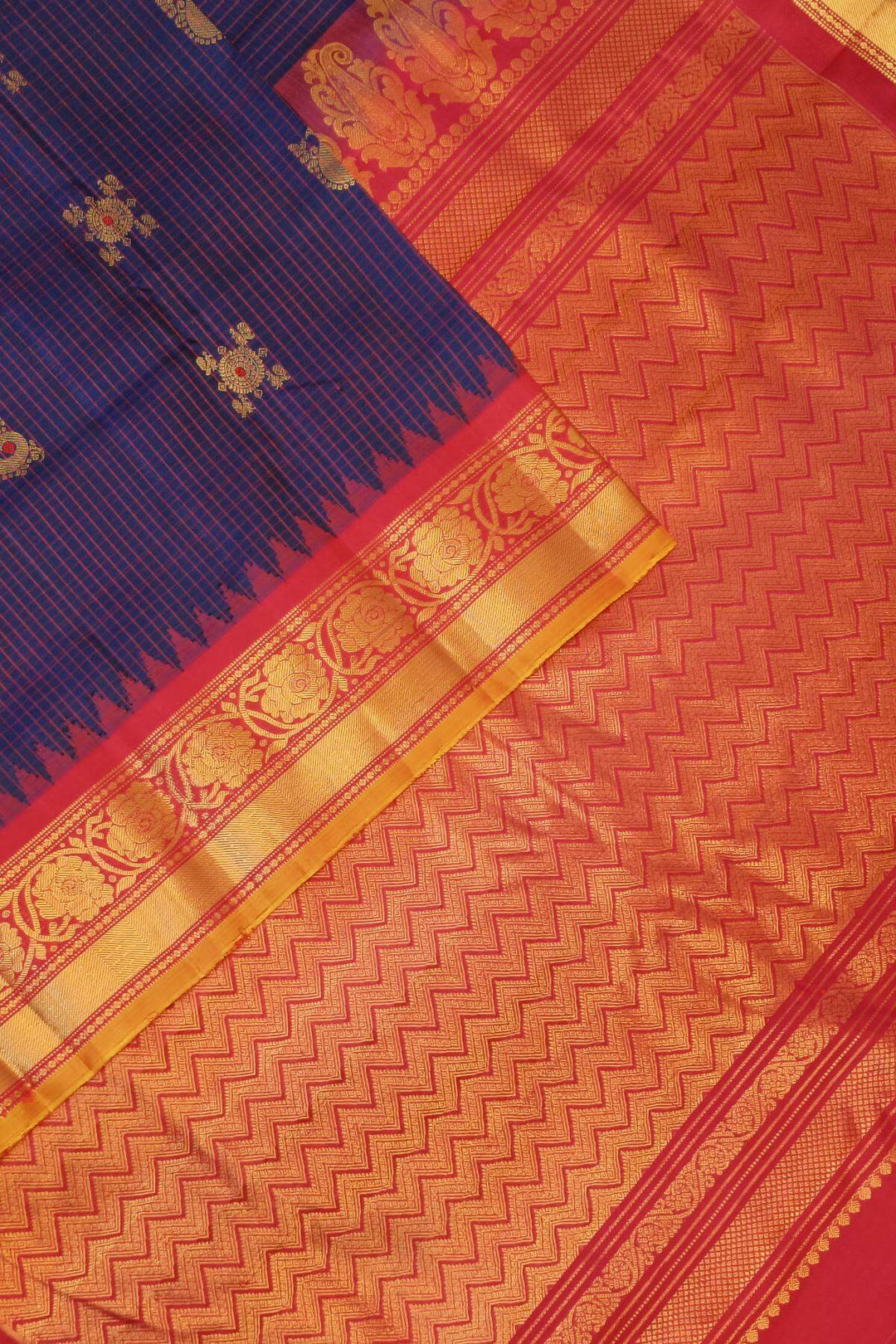 Gadwal pure silk saree in navy blue in fine checks  with meena gold  buttis