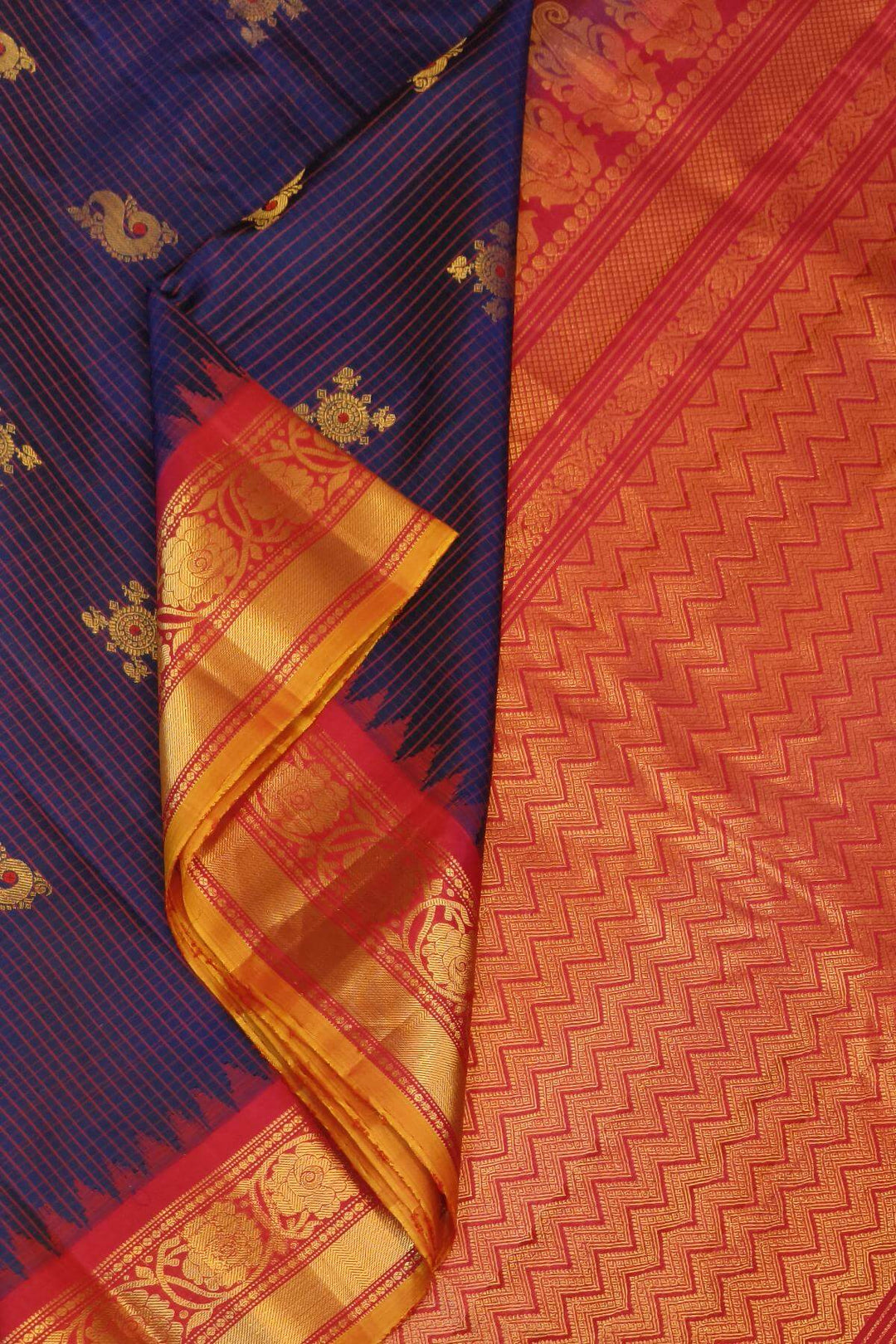 Gadwal pure silk saree in navy blue in fine checks  with meena gold  buttis