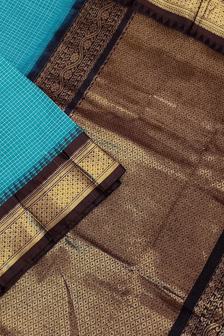 Gadwal cotton silk saree in self checks in teal blue