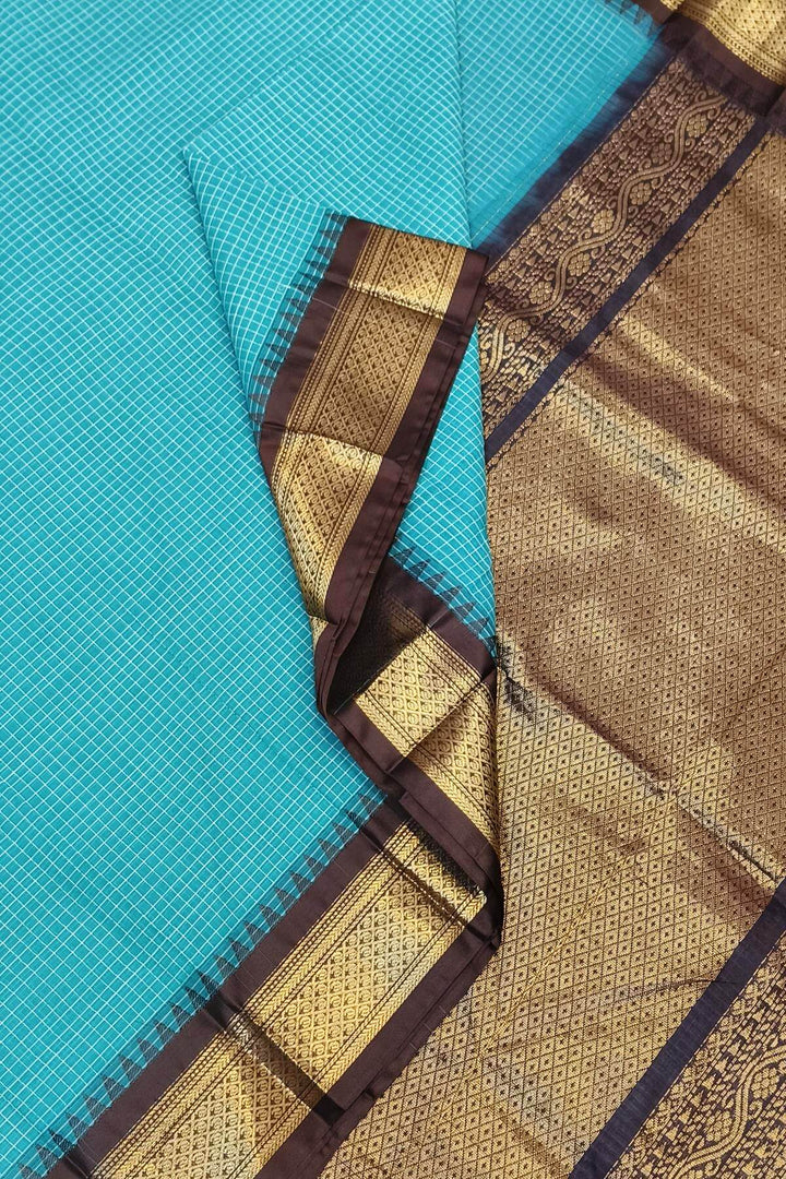 Gadwal cotton silk saree in self checks in teal blue