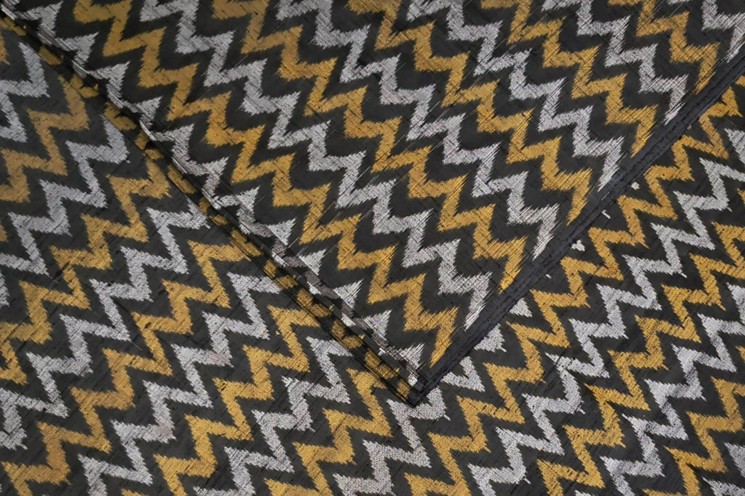 Handwoven Ikat pure silk fabric in black in zig zag pattern in dupion finish