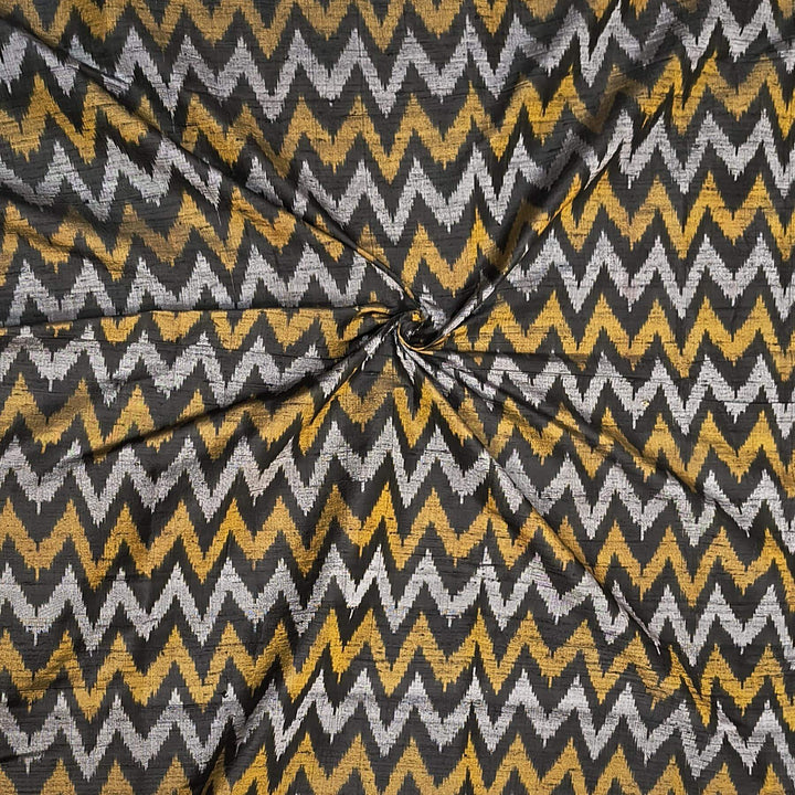 Handwoven Ikat pure silk fabric in black in zig zag pattern in dupion finish