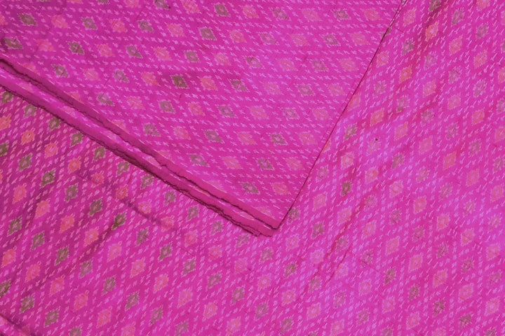 Handwoven Ikkat pure silk   fabric in dupioni finish in pink.