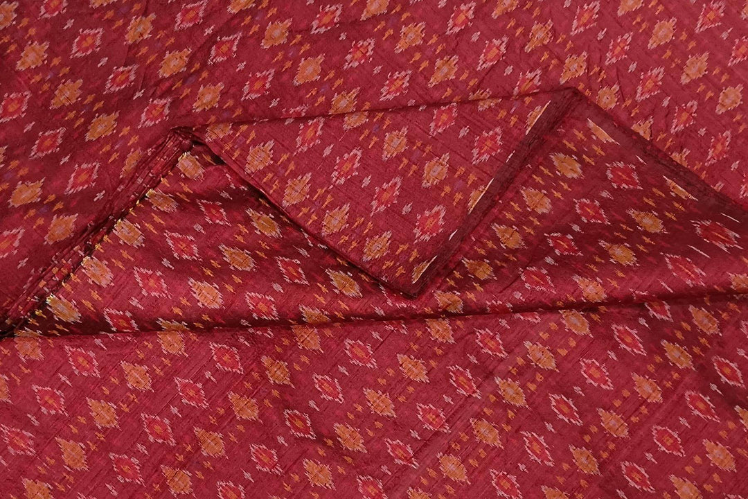 Handwoven Ikat pure silk fabric in  maroon in dupion finish