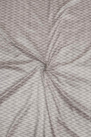 Handwoven Ikat pure silk fabric in off white in zig zag pattern in dupion finish