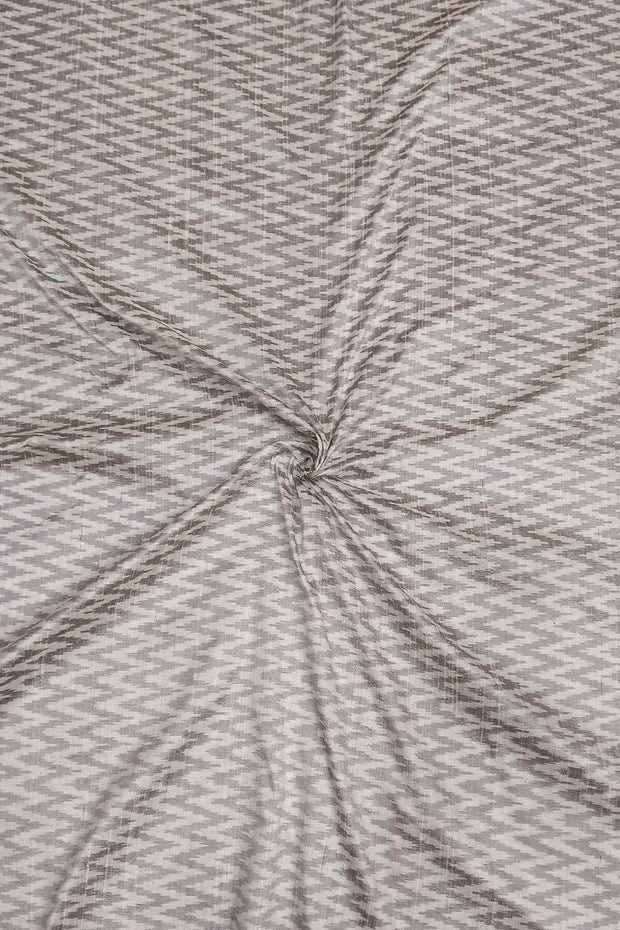 Handwoven Ikat pure silk fabric in off white in zig zag pattern in dupion finish