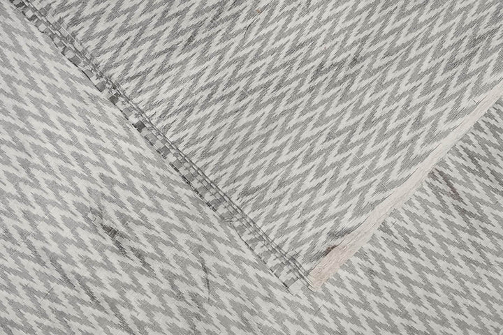 Handwoven Ikat pure silk fabric in off white in zig zag pattern in dupion finish