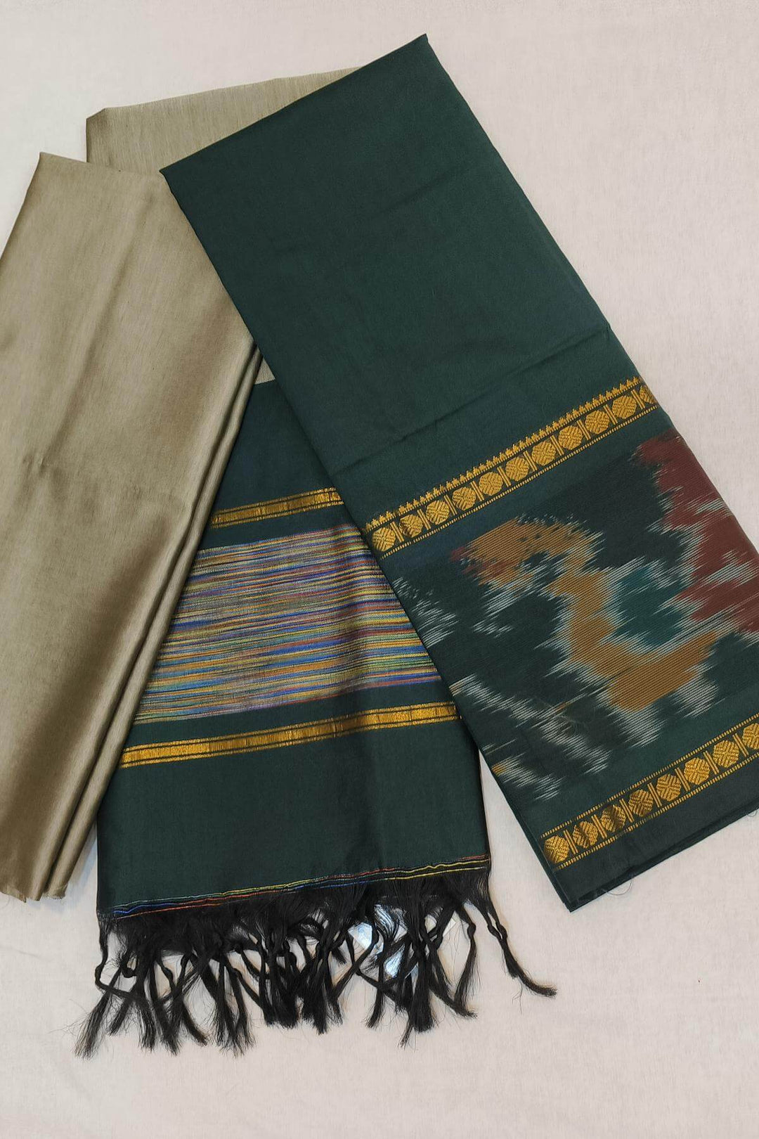 Handloom ikat silk cotton salwar suit material in bottle green