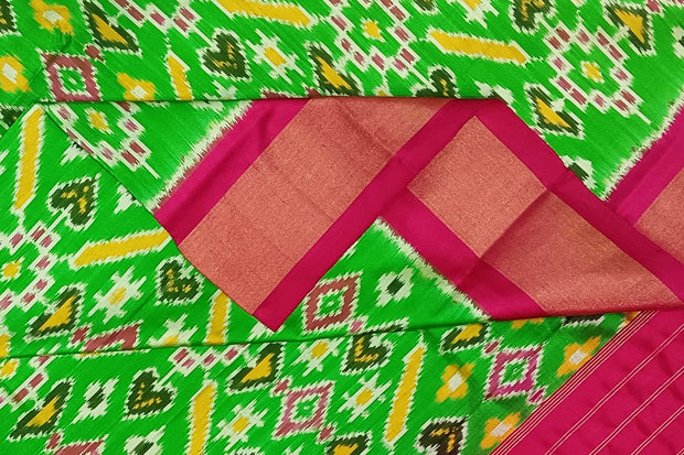 Handwoven ikat pure silk dupatta in green in pan bhat pattern