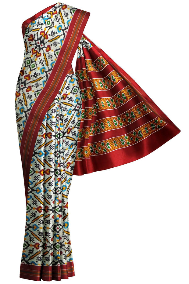 Stunningly beautiful & expertly crafted, handwoven double ikat pure silk saree in white in pan patola pattern