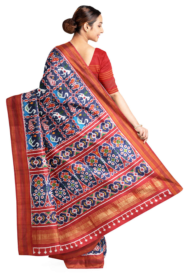 Double ikat pure silk saree in  blue in fish & swan pattern