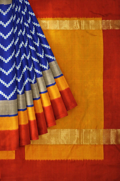 Ikat pure silk saree in blue in zigzag pattern and a zari border with  contrast pallu