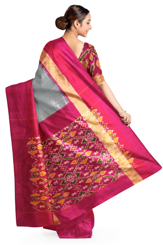 Handwoven Ikat pure silk saree in blue in  fine checks with a contrast pallu