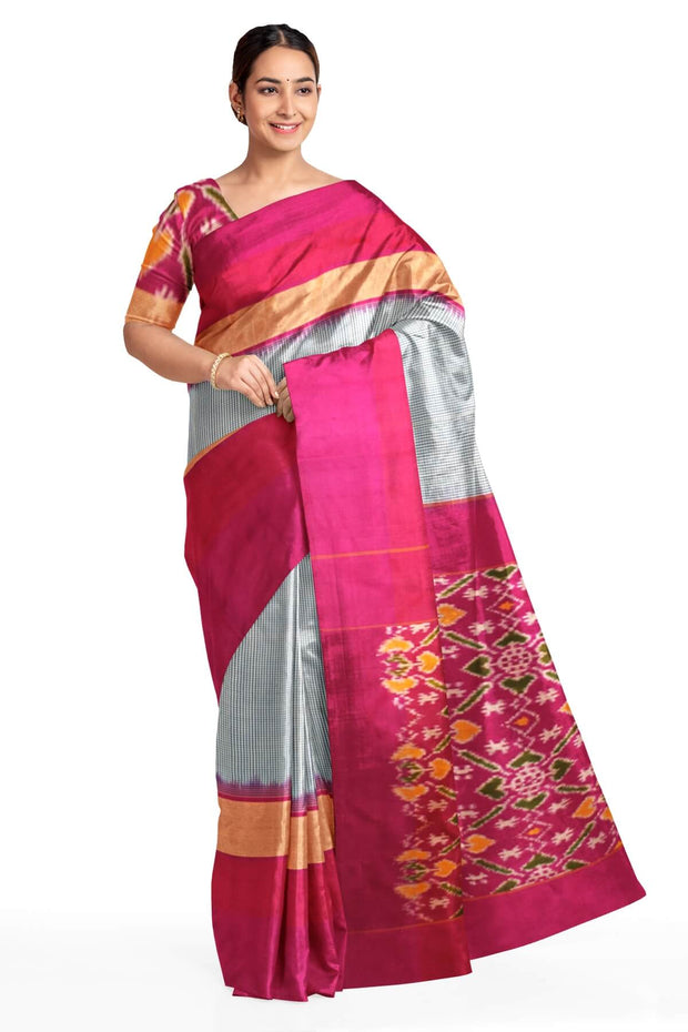 Handwoven Ikat pure silk saree in blue in  fine checks with a contrast pallu