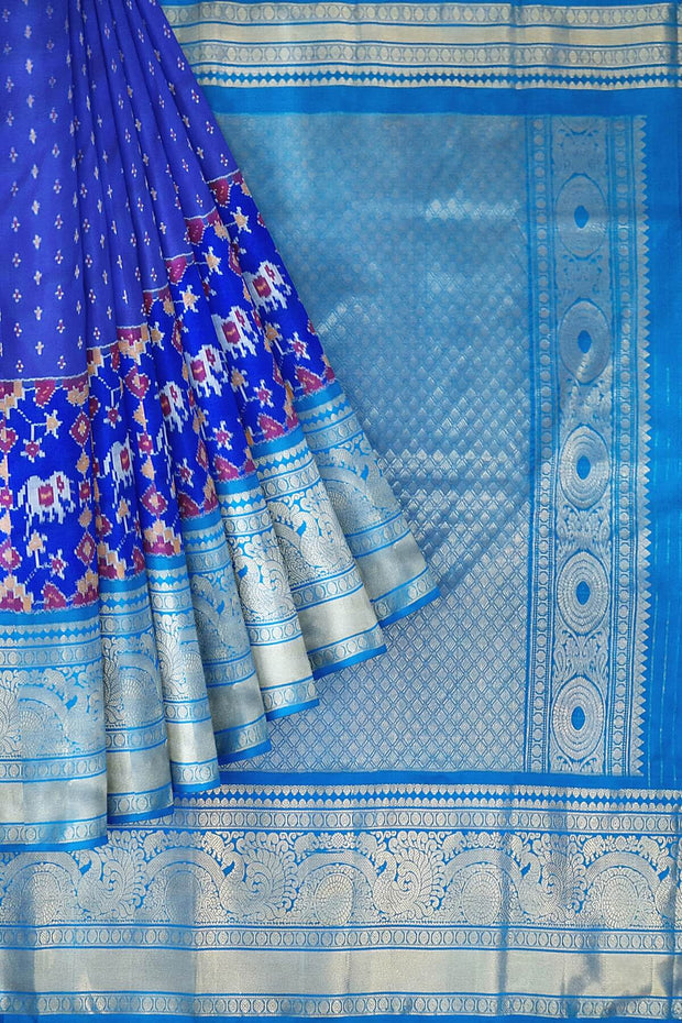 Ikat pure silk saree in blue with small motifs & a skirt border with elephant motifs.