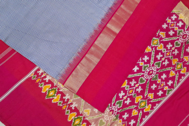 Handwoven Ikat pure silk saree in blue in  fine checks with a contrast pallu