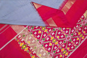 Handwoven Ikat pure silk saree in blue in  fine checks with a contrast pallu