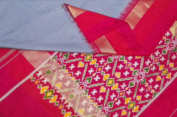 Handwoven Ikat pure silk saree in blue in  fine checks with a contrast pallu