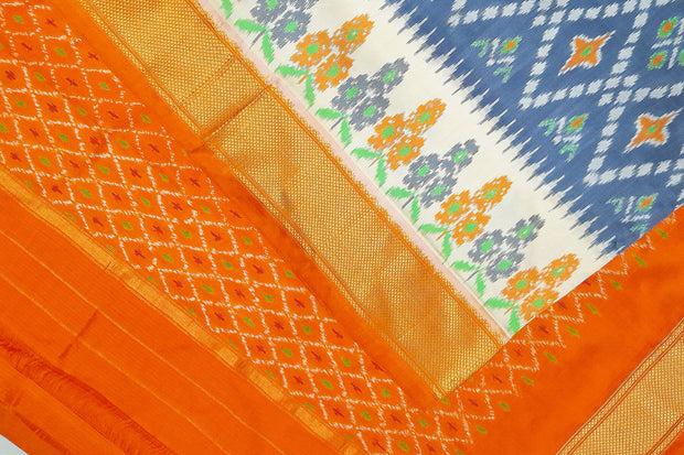 Ikat pure silk saree in grey & orange in diamond pattern