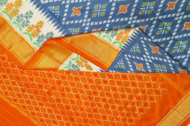 Ikat pure silk saree in grey & orange in diamond pattern