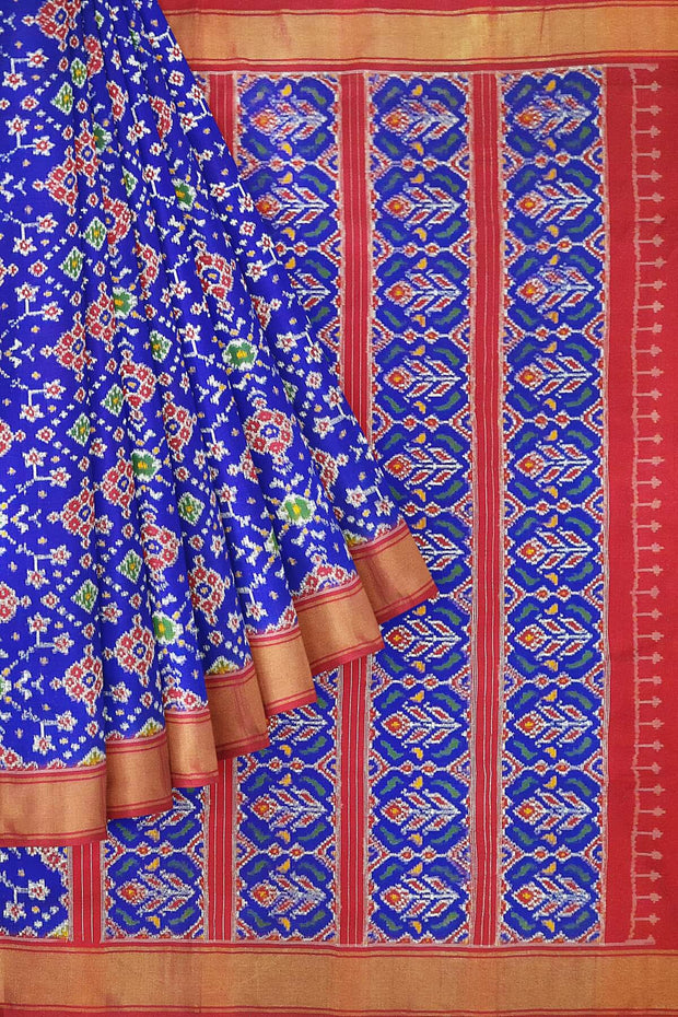 Double ikat pure silk saree in royal blue in  navaratan pattern.