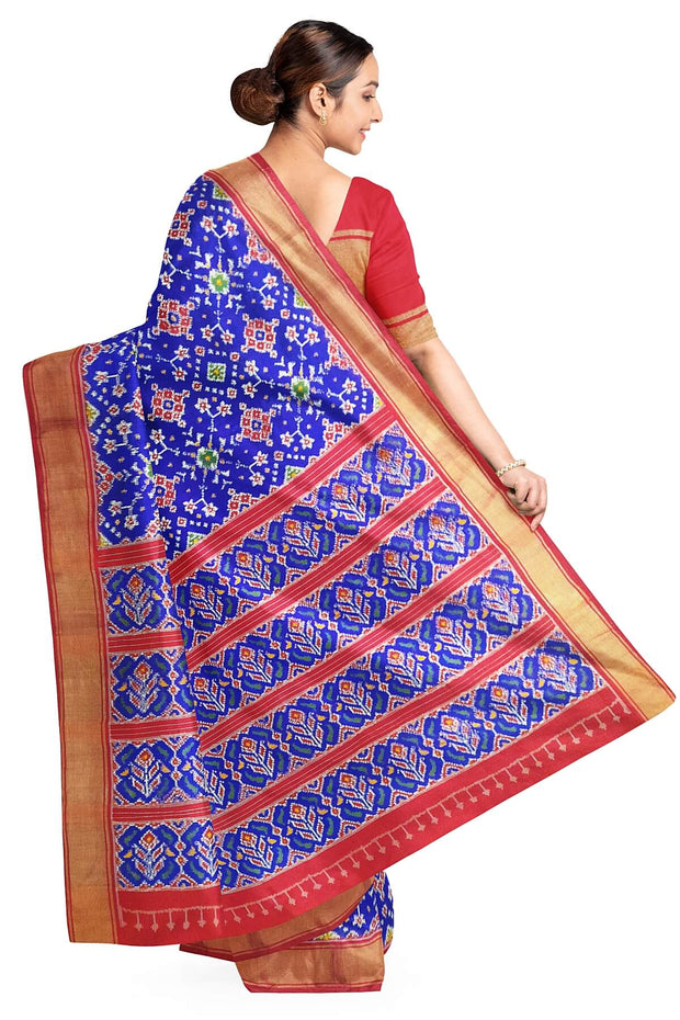 Double ikat pure silk saree in royal blue in  navaratan pattern.