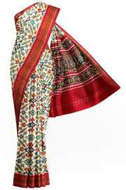 Double ikat pure silk saree in off white in patan patola  pattern