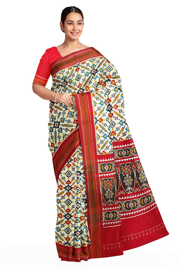 Double ikat pure silk saree in off white in patan patola  pattern
