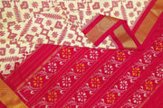 Ikat pure silk saree in off white in pan bhat pattern .