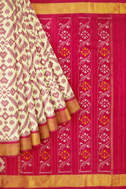 Ikat pure silk saree in off white in pan bhat pattern .