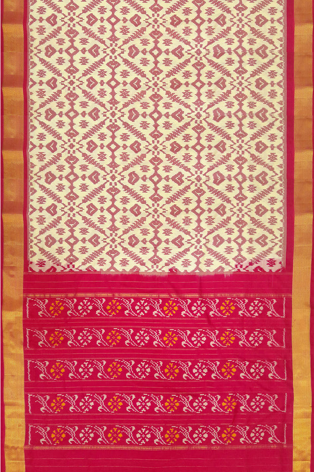 Ikat pure silk saree in off white in pan bhat pattern .