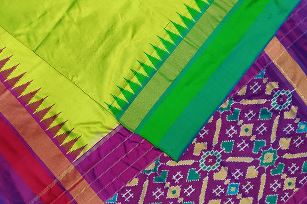 Handwoven Ikat pure silk saree in radium green with Ganga Jamuna borders