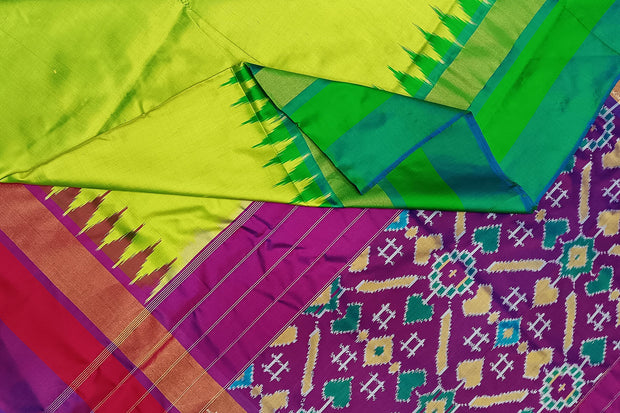 Handwoven Ikat pure silk saree in radium green with Ganga Jamuna borders