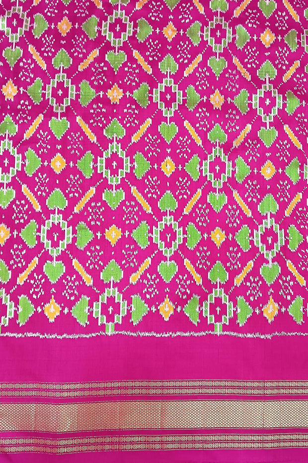 Handwoven Ikat pure silk saree in fine checks in green with elephant motifs in skirt border