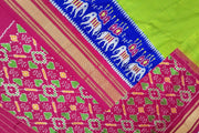Handwoven Ikat pure silk saree in fine checks in green with elephant motifs in skirt border