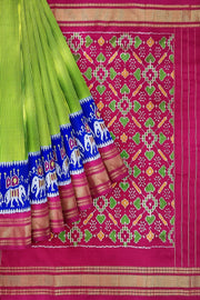 Handwoven Ikat pure silk saree in fine checks in green with elephant motifs in skirt border