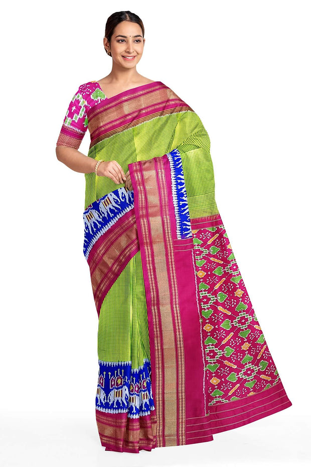Handwoven Ikat pure silk saree in fine checks in green with elephant motifs in skirt border