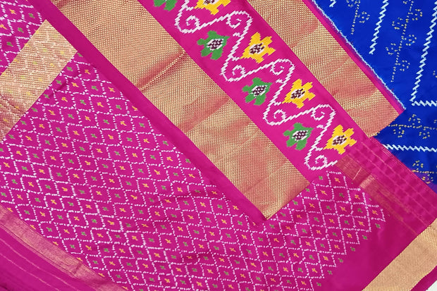 Handwoven Ikat pure silk saree in blue with diagonal lines and floral  motifs in skirt border.