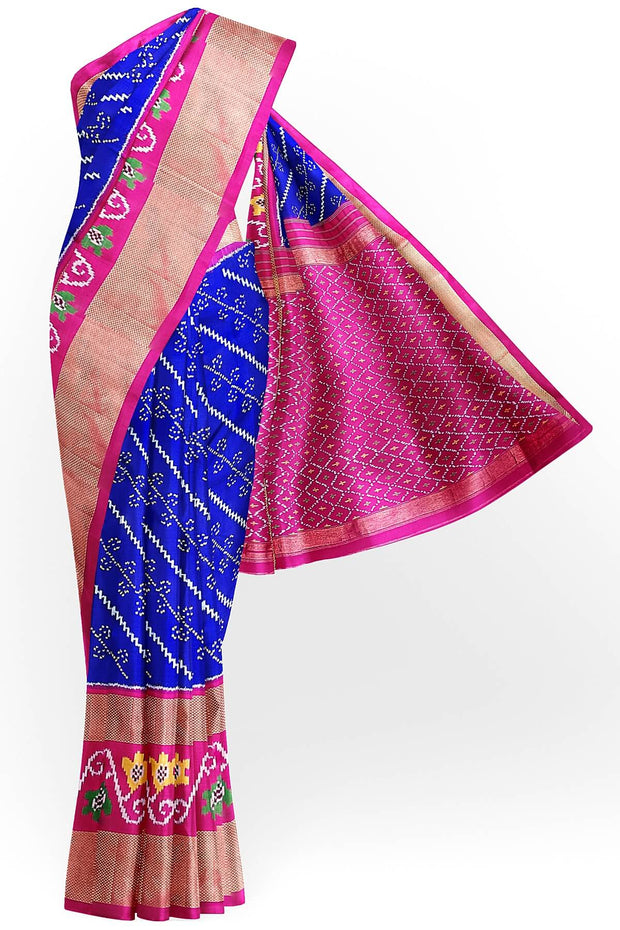 Handwoven Ikat pure silk saree in blue with diagonal lines and floral  motifs in skirt border.