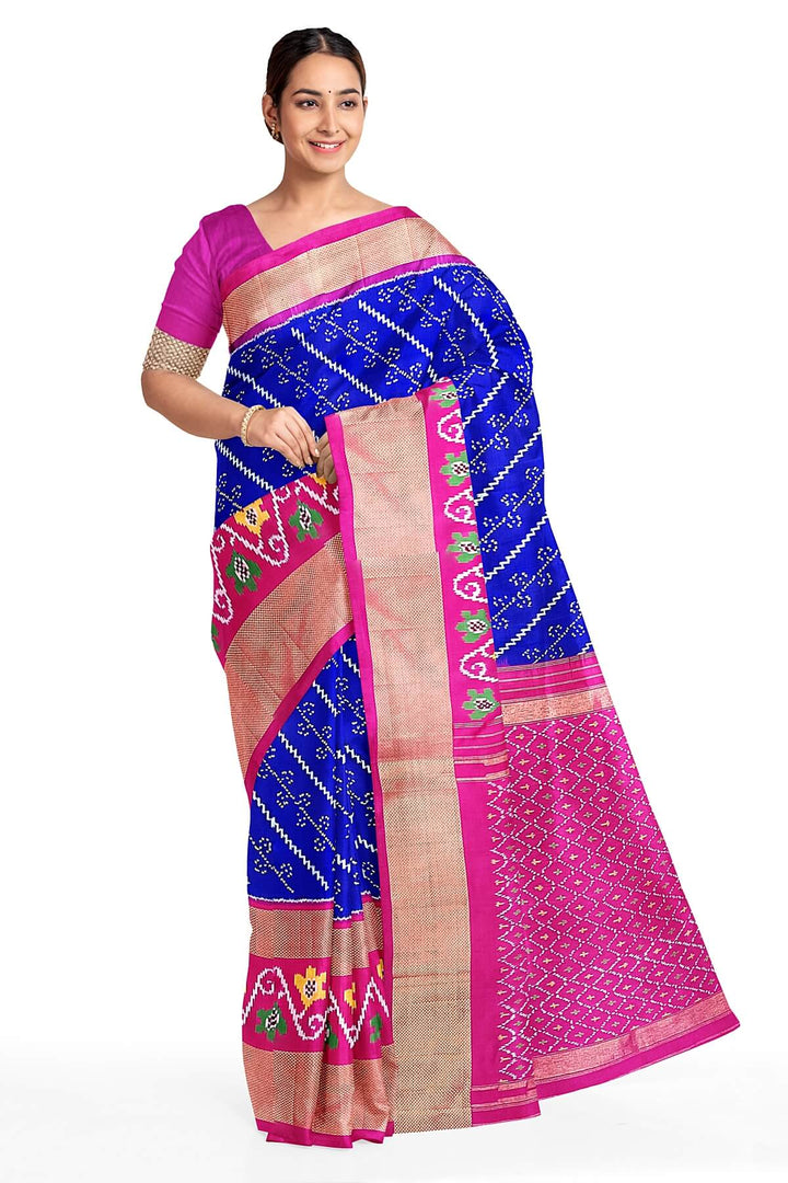 Handwoven Ikat pure silk saree in blue with diagonal lines and floral  motifs in skirt border.