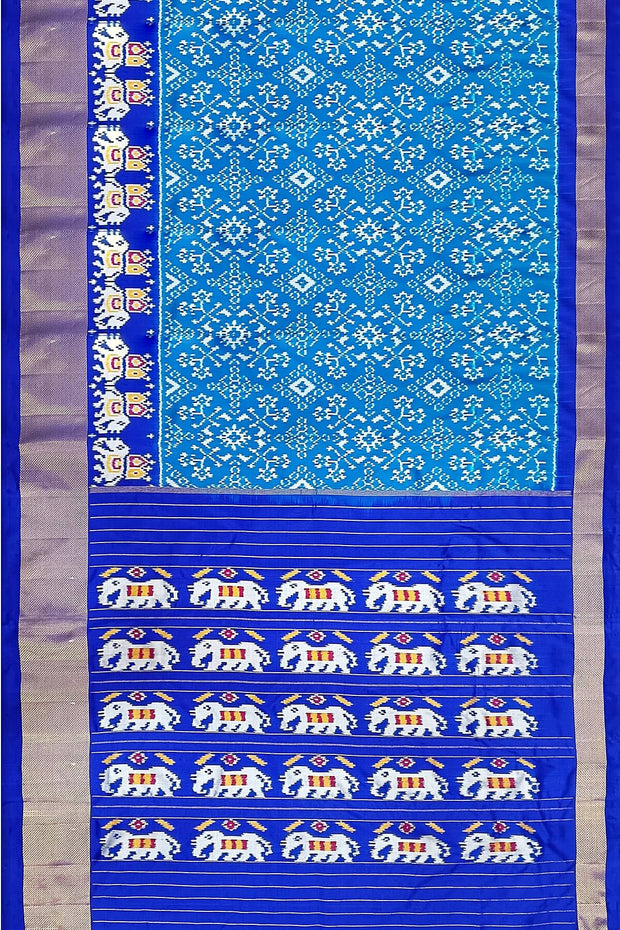 Handwoven ikat pure silk saree in  copper sulphate  blue with combination of navratan & diamond pattern.