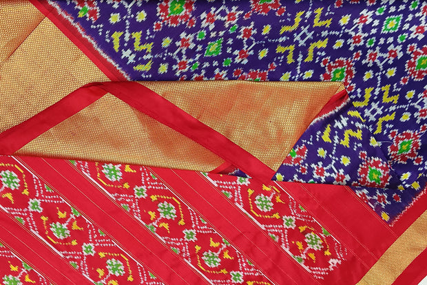 Handwoven Ikat pure silk saree in violet in navratan pattern.