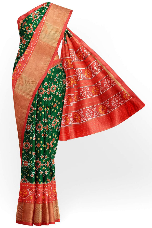Handwoven Ikat pure silk saree in bottle green in navratan pattern.